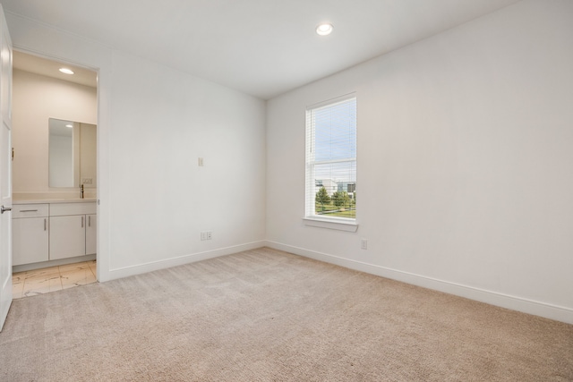 view of carpeted spare room