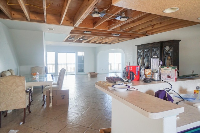 kitchen with light tile patterned flooring