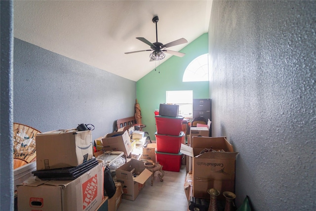 bonus room featuring high vaulted ceiling, light wood-type flooring, and ceiling fan