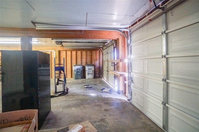 garage featuring black refrigerator