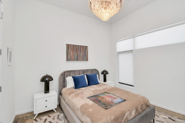 bedroom with a chandelier