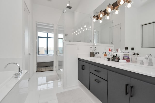 bathroom featuring vanity, separate shower and tub, and tile patterned flooring