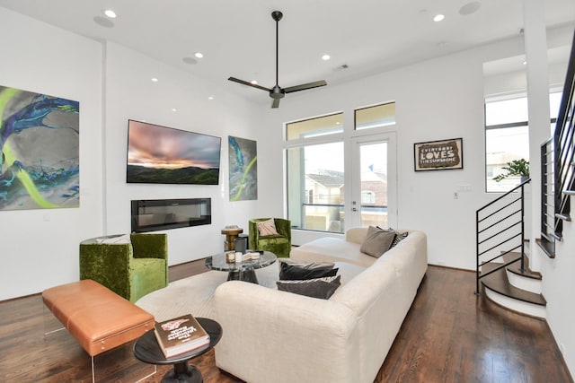 living room featuring dark wood-type flooring