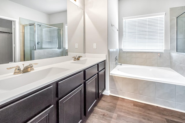 bathroom with vanity and plus walk in shower