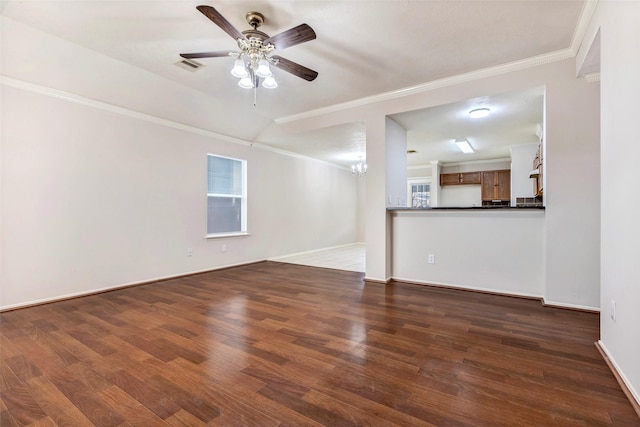 unfurnished living room featuring hardwood / wood-style floors, crown molding, and ceiling fan with notable chandelier