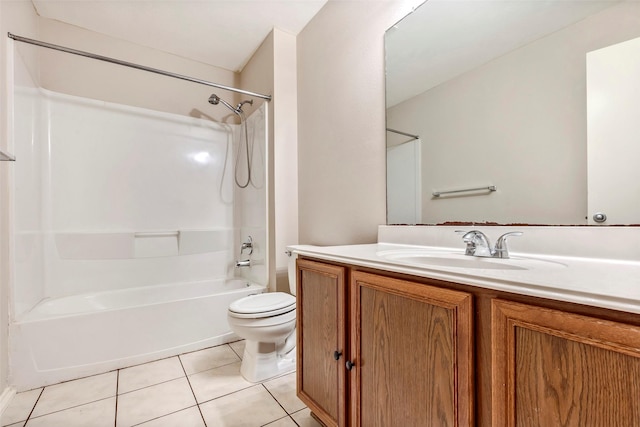 full bathroom with tile patterned floors, toilet,  shower combination, and vanity