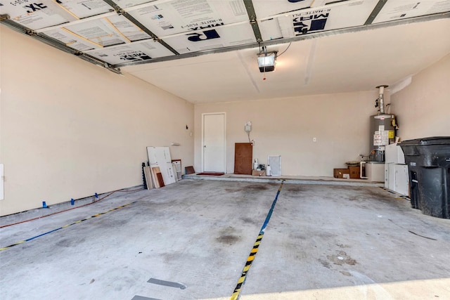 garage with a garage door opener and water heater