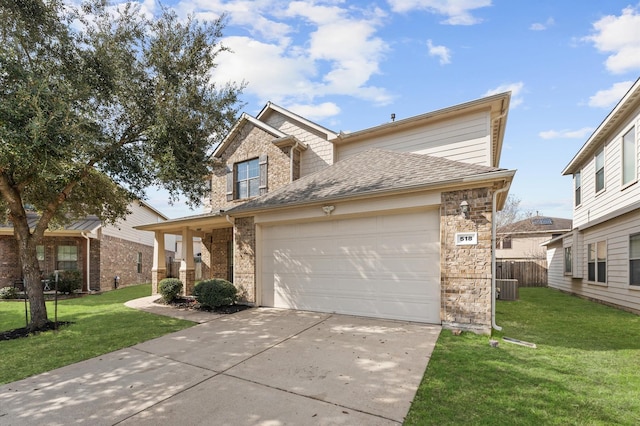 view of front of property with cooling unit, a garage, and a front lawn