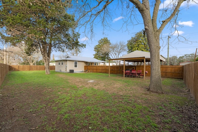 view of yard with a gazebo and central AC unit