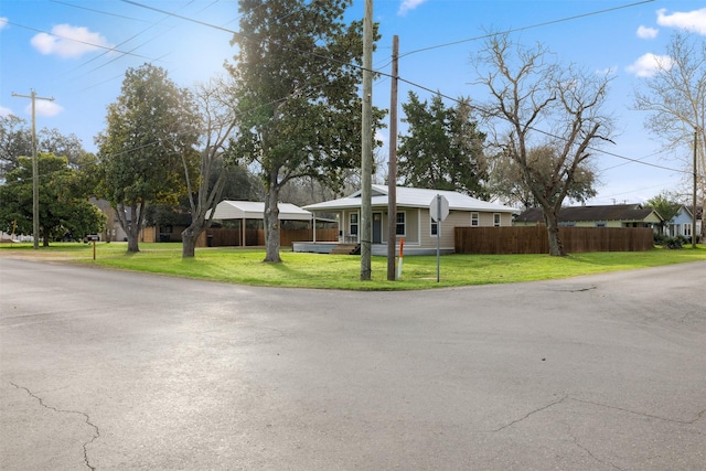 single story home with a front lawn