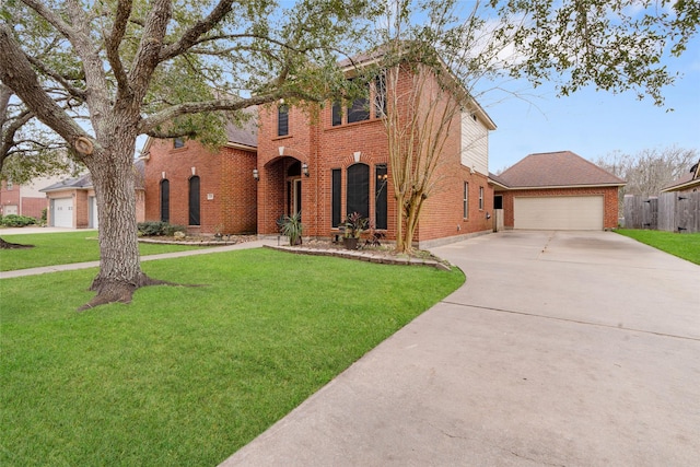 view of front of house with a garage and a front yard