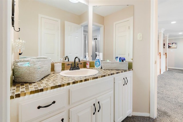125 Indian Warrior Trl, Lake Jackson, TX 77566 - bathroom with vanity and decorative columns