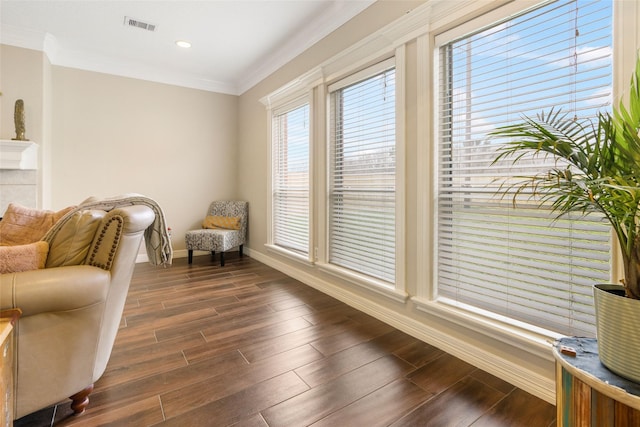 125 Indian Warrior Trl, Lake Jackson, TX 77566 - living area featuring dark hardwood / wood-style flooring and crown molding