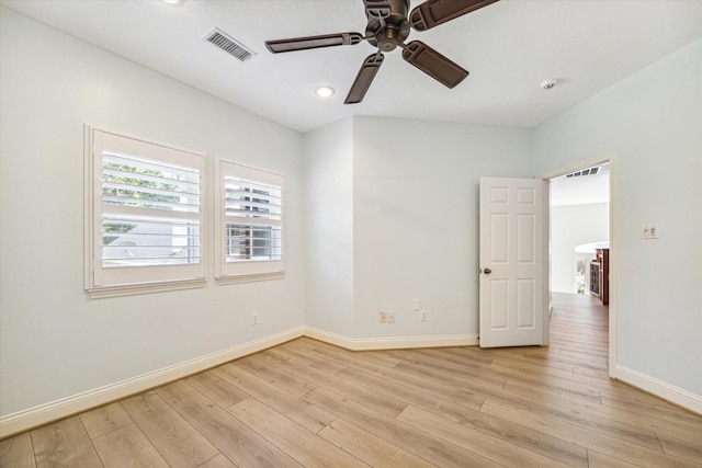 spare room featuring ceiling fan and light wood-type flooring