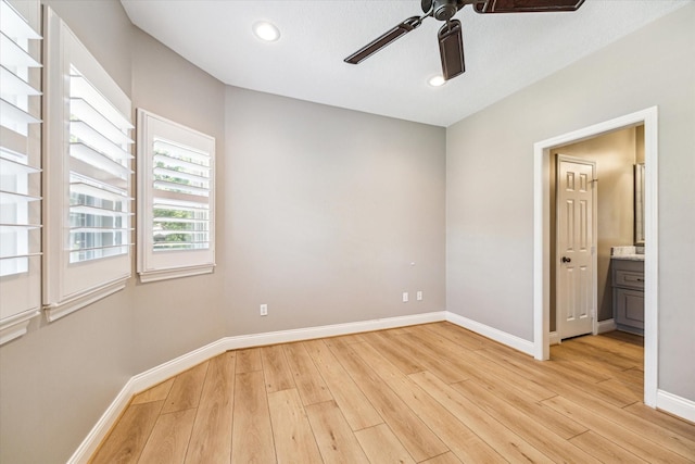 unfurnished room with light hardwood / wood-style floors and ceiling fan