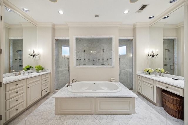 bathroom featuring vanity, ornamental molding, and shower with separate bathtub