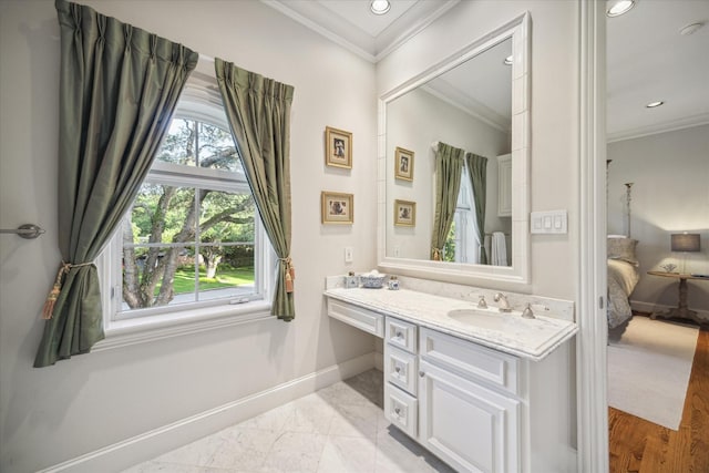 bathroom featuring vanity and crown molding