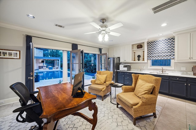 tiled home office with crown molding, wet bar, and ceiling fan