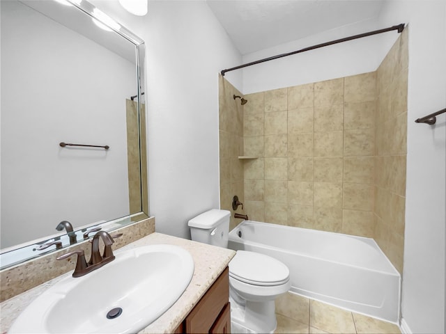 full bathroom featuring tile patterned flooring, tiled shower / bath, vanity, and toilet