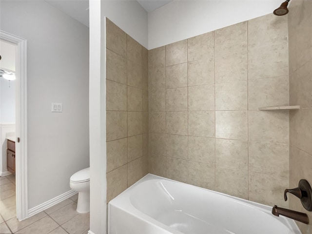 bathroom featuring bathtub / shower combination, tile patterned floors, and toilet