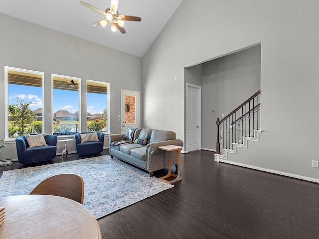 living room with high vaulted ceiling, hardwood / wood-style floors, and ceiling fan