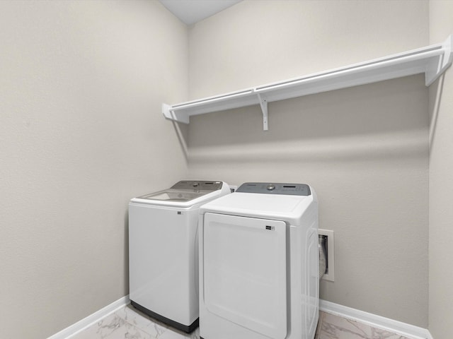 laundry area featuring washer and clothes dryer