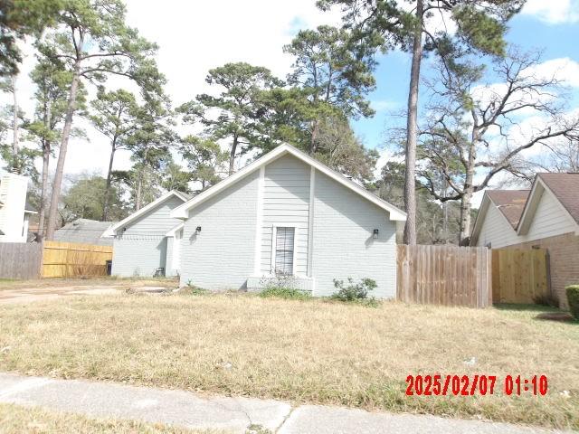 view of home's exterior featuring a yard