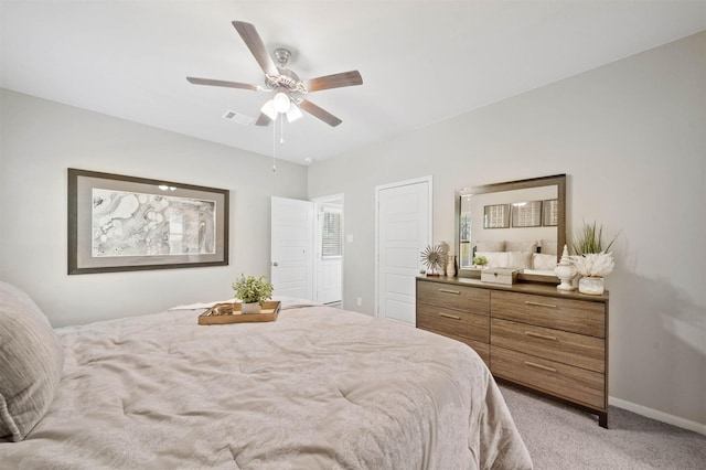 carpeted bedroom featuring ceiling fan