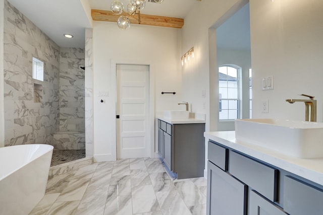 bathroom featuring shower with separate bathtub and vanity