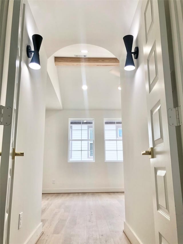 2221 Bevis St, Houston, TX 77008 - spare room with wood finished floors and arched walkways