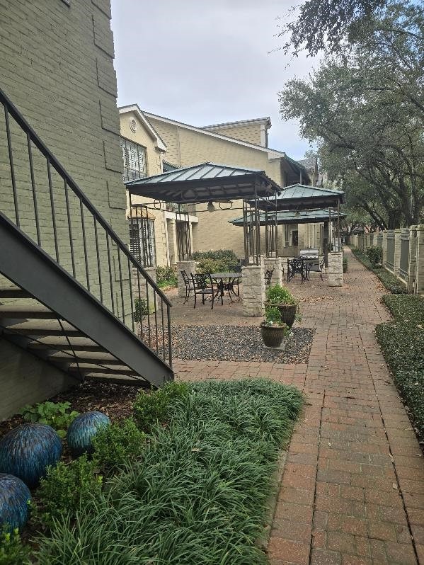 view of patio / terrace featuring a grill and a gazebo