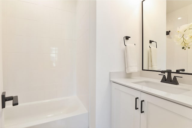 full bathroom featuring tub / shower combination and vanity