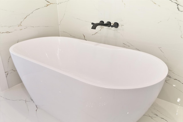 room details featuring a freestanding tub