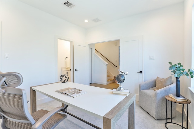 office space with visible vents and recessed lighting