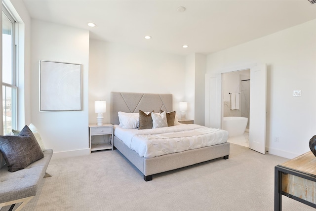 bedroom with recessed lighting, light carpet, and baseboards