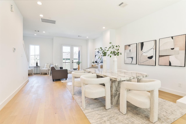 dining area featuring recessed lighting, baseboards, visible vents, and light wood finished floors