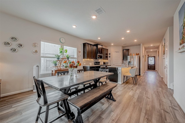 dining area featuring light hardwood / wood-style flooring