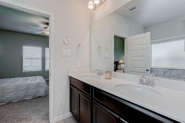 bathroom with vanity and ceiling fan