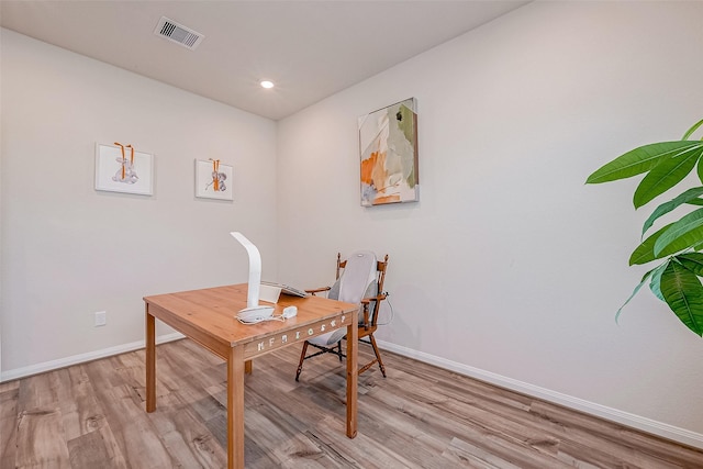 office area with light hardwood / wood-style flooring