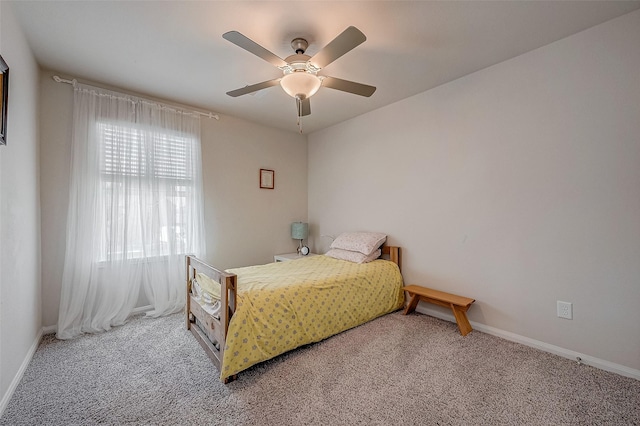 bedroom featuring ceiling fan and carpet flooring