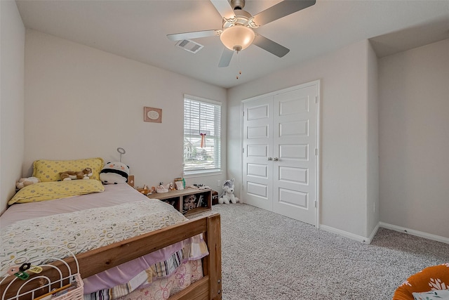 carpeted bedroom with ceiling fan