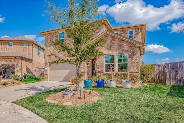 view of property featuring a garage and a front lawn