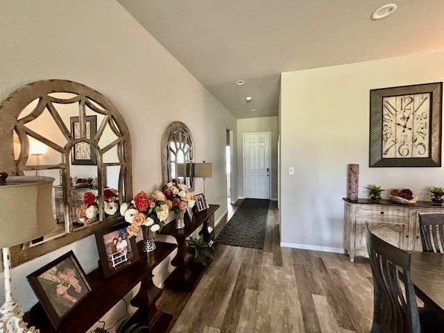 corridor featuring hardwood / wood-style floors