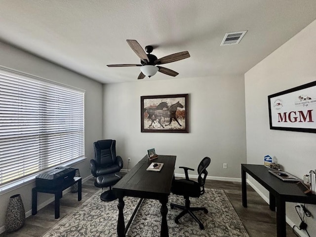 office space with hardwood / wood-style flooring and ceiling fan