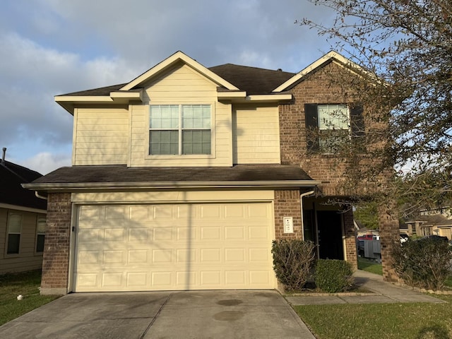 view of front of property featuring a garage