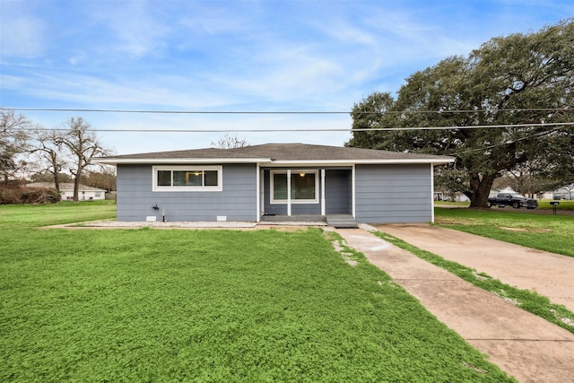 single story home featuring a front yard