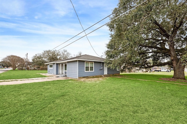 view of home's exterior with a yard