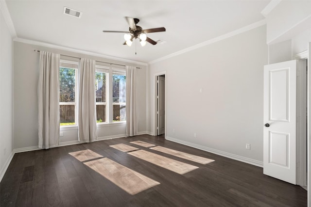 unfurnished room featuring ornamental molding, dark wood-type flooring, and ceiling fan