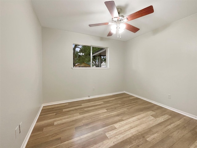 unfurnished room featuring ceiling fan and light hardwood / wood-style floors