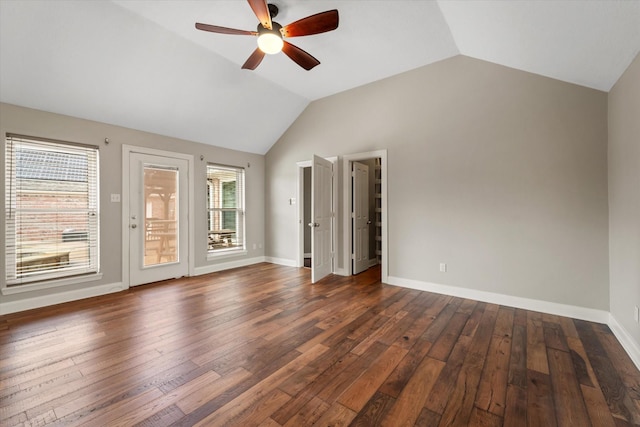 unfurnished room with vaulted ceiling, dark hardwood / wood-style floors, and ceiling fan